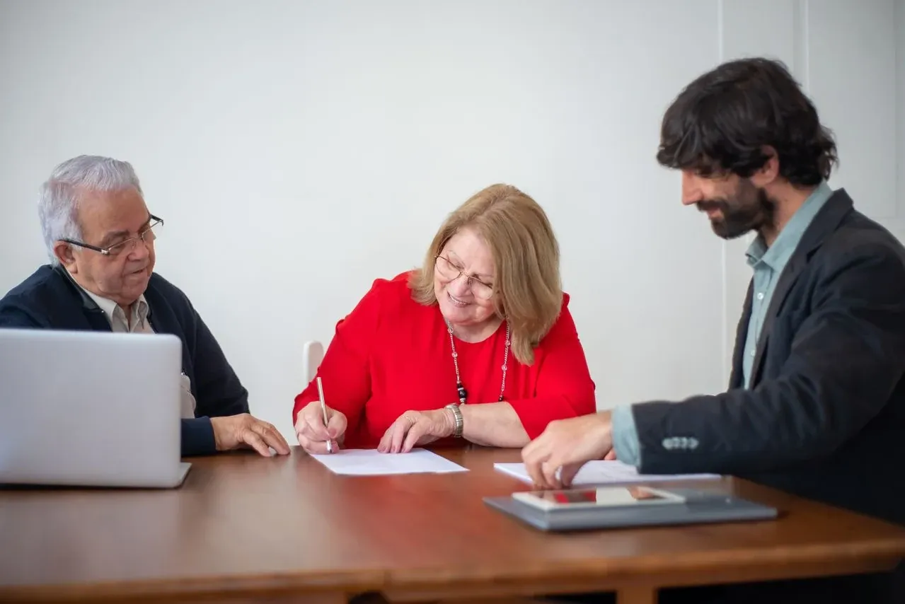 Signing the property deed at a Spanish notary